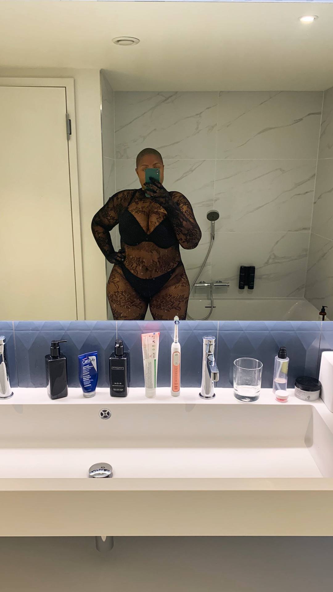 Sable Gold wearing a black bodystocking. Luxembourg companion,